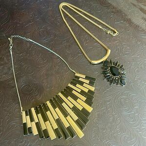 Gold and black necklaces